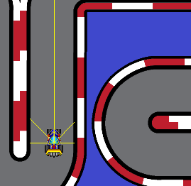 A car being driven manually around a corner of the Pygame track